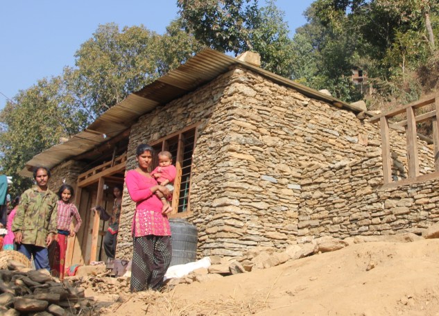 Uttam's family recently moved their shelter tin on to this new permanent house.
